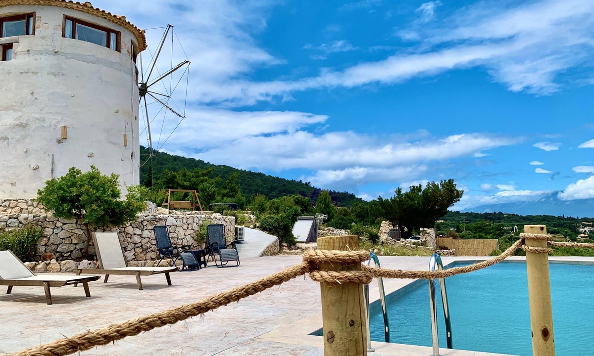 Elation Villa | Authentic windmill villa , stunning sea view , live sunrise near the Shipwreck.