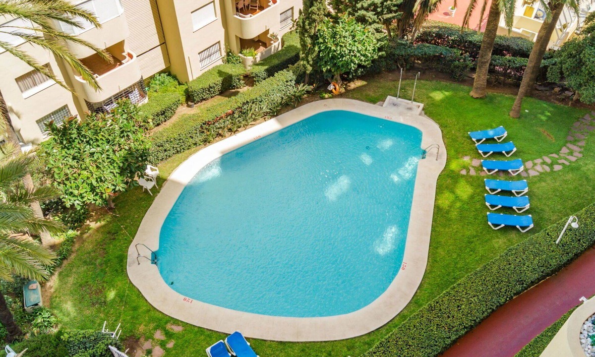 Urbanizacion Puerto de Estepona Apartment | Cosy apartment for 4 people with A/C, pool, WIFI, TV and balcony