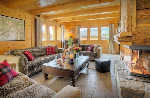 Le Chinaillon Ski Chalet | Chalet Tolar - mountain holiday base, hot tub and piste view - OVO Network