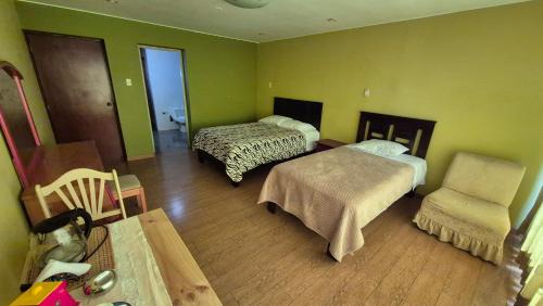 La Perla House | Dormitorio con baño privado a 25 minutos del Apto
