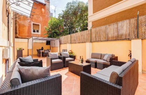 Gianicolense Apartment | Historic 4-Suite Villa with Lush Gardens and Luxurious Hall in Rome