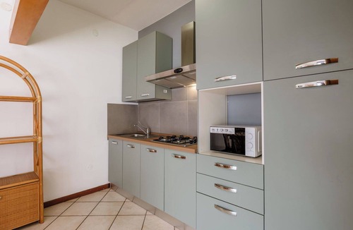 Villaggio Sanghen Apartment | Lovely apartment for 6 people with A/C, WIFI, pool, TV, terrace and pets allowed