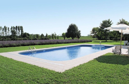 Povoletto House | Nice apartment in villa for 4 guests with pool, A/C, WIFI, TV, terrace and pets allowed