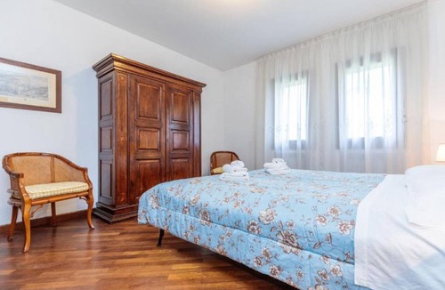 Bagnolo Villa | The Space🏡 Villa Gerla: Exclusive Dependance in a Palladian Villa – An Oasis of Peace and Elegance near Venice, Padua and TrevisoLive a unique experience in the Dependance of Villa Gerla, a residence with a rustic yet refined style, surrounded by a