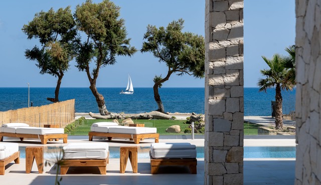 Artemis Villa, Beachfront Retreat with Heated Pool