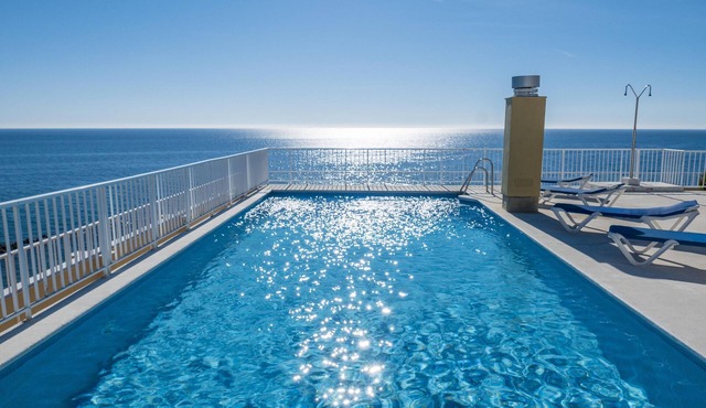 Beachfront Condo in Marbella Center with 2 Pools & Parking