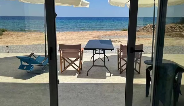Brand new beachfront house in Koutsouras — 30 steps to crystal-clear water!