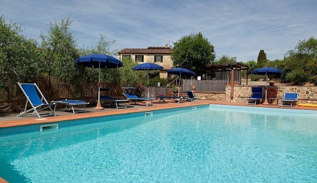 Casa Sparviero A: A characteristic and welcoming two-story apartment that covers the entire top floor of a villa surrounded by meadows and by green hills, with Free WI-FI.