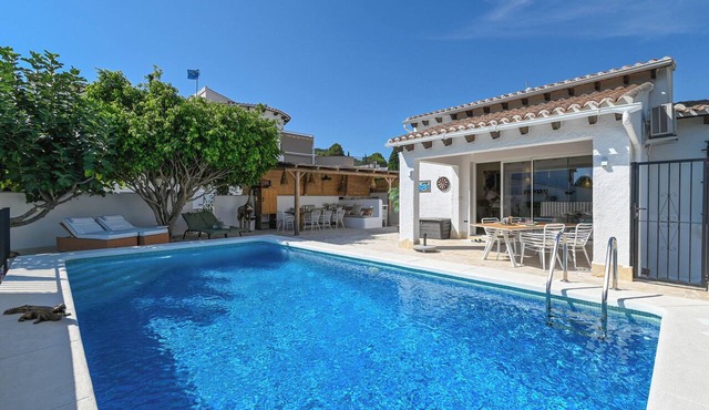 Ibiza-Style Villa with Pool, Outdoor Kitchen, and King-Size Beds