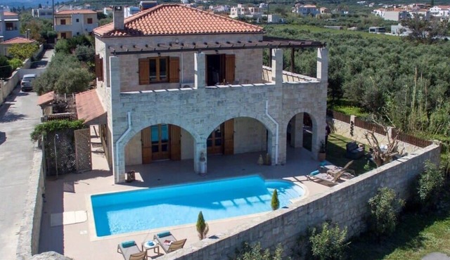Luxury stone villa with big private pool at beach