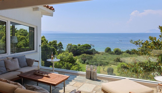 Skiathos luxury beachfront Villa Alma, Steps to the beach, 10 min drive to Town.