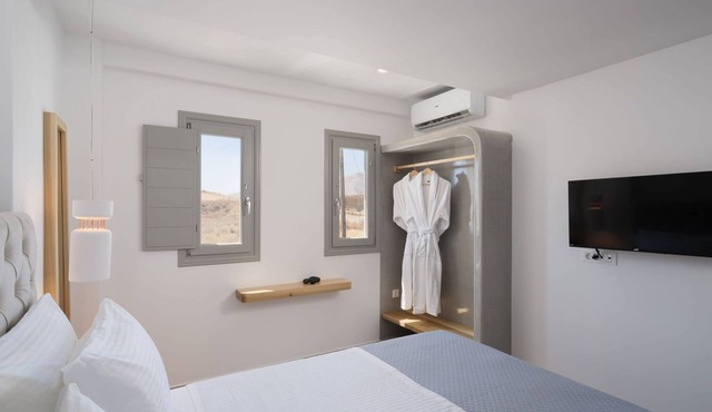 Sophisticated Santorini Suite | Two Bedroom Suite with Private Hot Tub