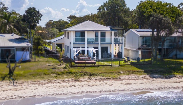 Step out to Absolute Beachfront