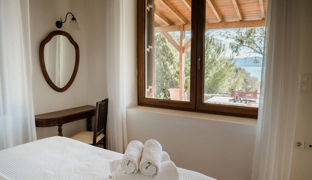 Traditional Architecture Stone House in Seafront Olive Grove