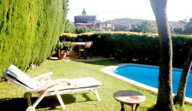 Typical Spanish Masia (country house) of natural stone with private garden and pool