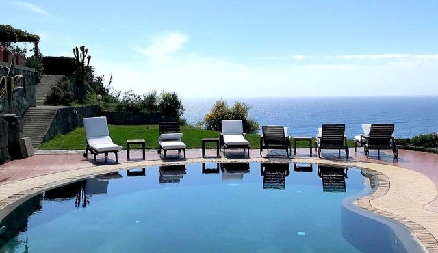 Villa Alisea: A splendid two-story villa located on a hillside, facing the sea, with Free WI-FI.