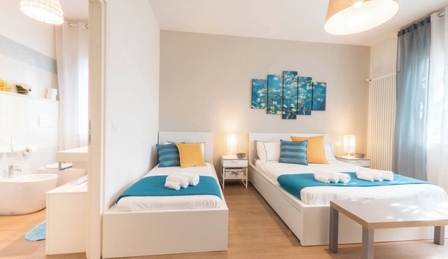 VILLA DUE GIARDINI Appartamento tre camere da letto ciascuna con bagno privato