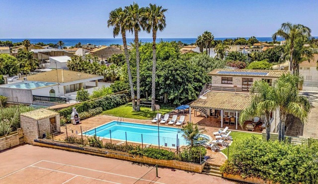 Villa with ancient olive tree near Punta Secca